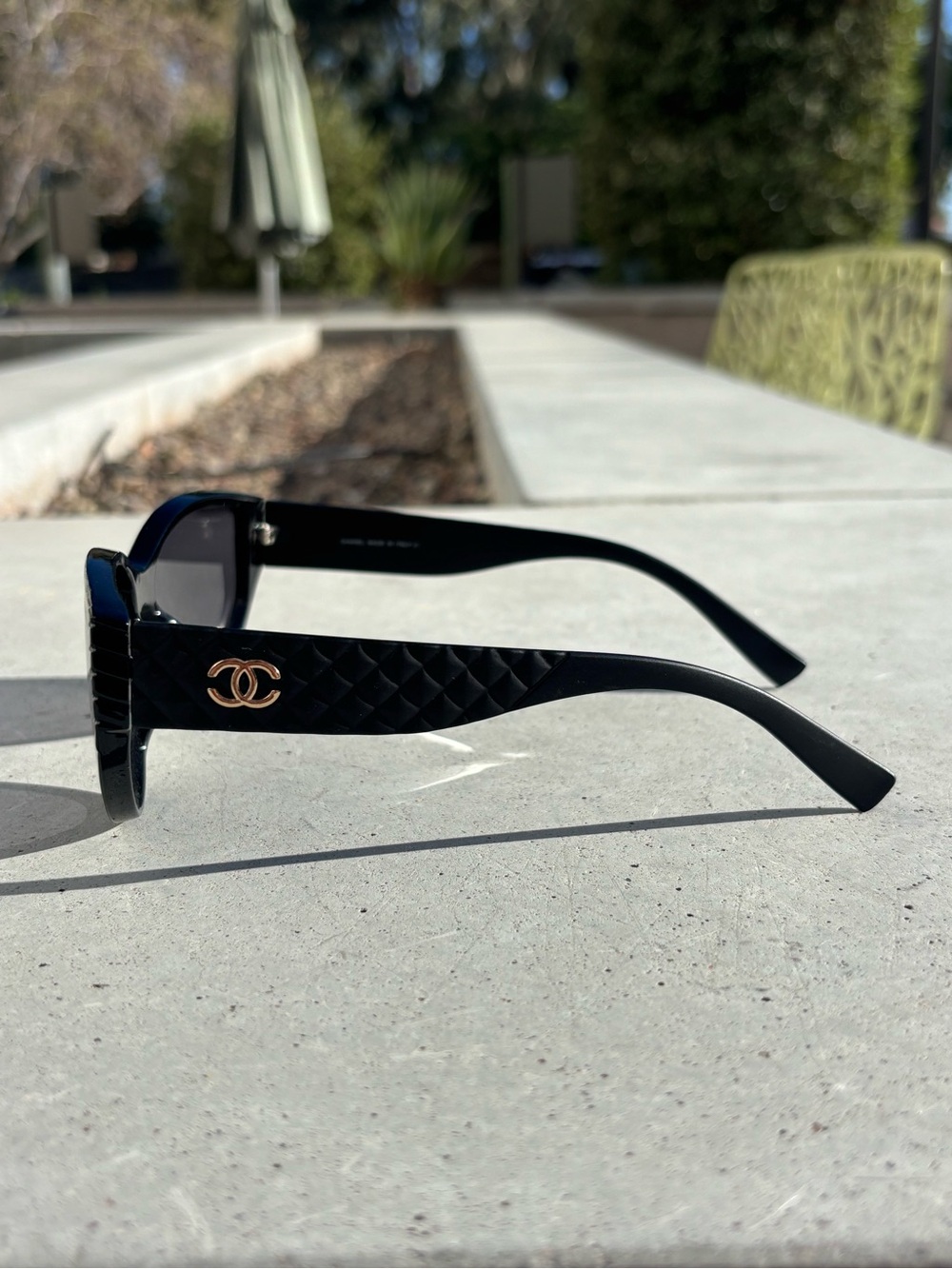 CHANEL Black Sunglasses with Gold CC Emblem - Picture 2 of 3
